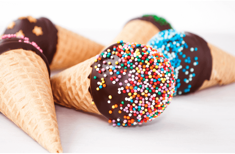 Five Ice Cream Pops with chocolate frosting and multi-colored sprinkles