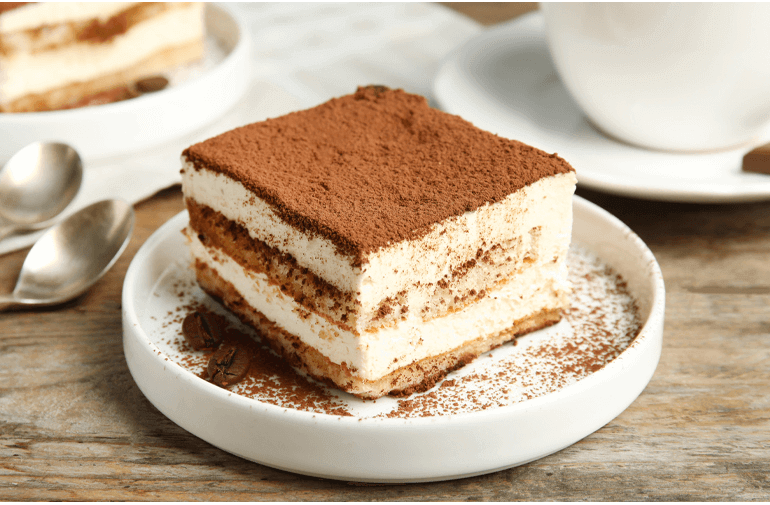 Frozen tiramisu on a white plate